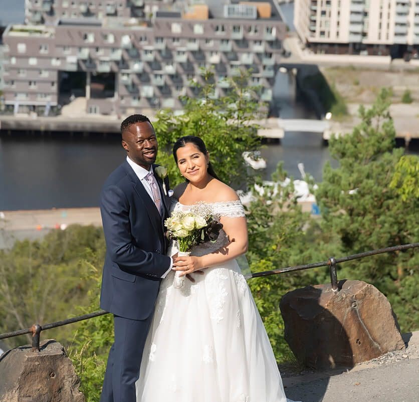 A man and woman posing for a picture.