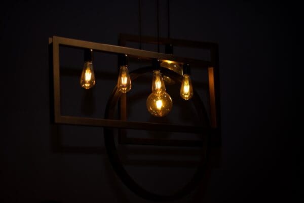 A group of light bulbs hanging from the ceiling.