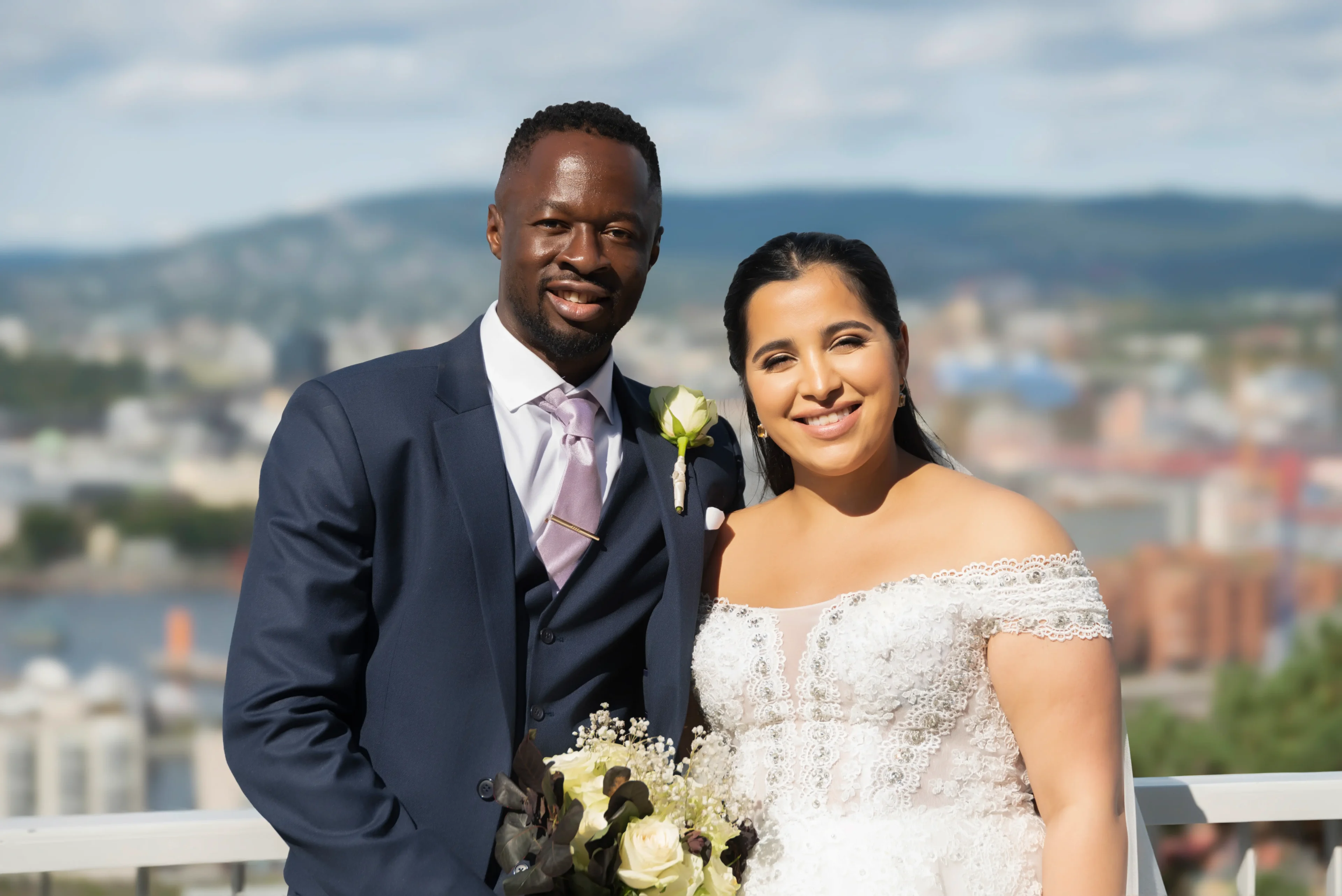 A man and woman posing for a picture.